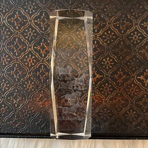 3D laser-etched imagery of running horses and mountains